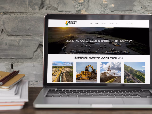 A laptop displaying a professionally designed website, showcasing our exemplary web development services.