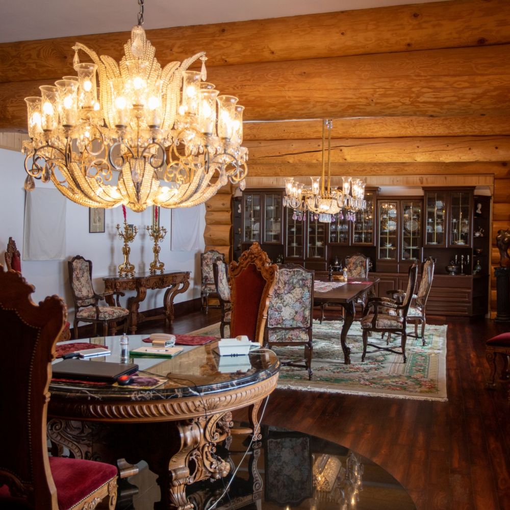 Log cabin photography for NBCTA highlighting traditional wood construction, architectural detail, and northern design craftsmanship.