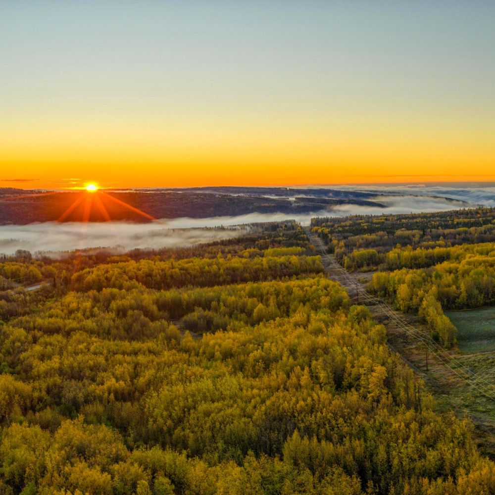 Nan w&uacute;&uacute;jǫ anaw&uacute;&uacute;dle photography showing land, water, and cultural stewardship that strengthens community well-being and sustainable forest management.